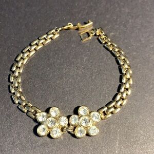 3/$12. Cute gold tone flower bracelet